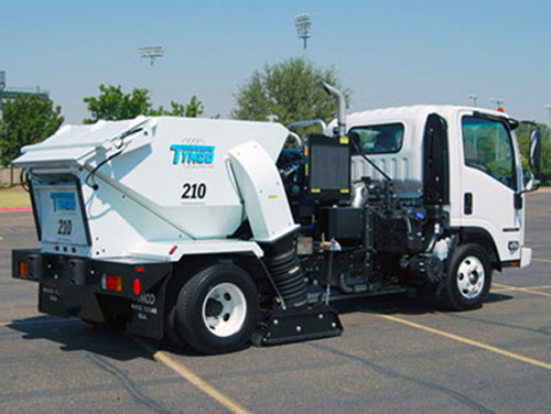 TYMCO 210 Sweeper Truck in Parking Lot
